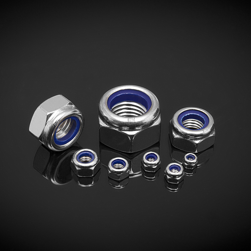 DIN 985 ruostumatonta terästä vallitseva vääntömomenttityyppi kuusikulmaiset ohuet mutterit, joissa ei-metallinen sisäosa DIN 985 ruostumatonta terästä vallitseva vääntömomenttityyppi kuusikulmaiset ohuet mutterit, joissa ei-metallinen sisäosa