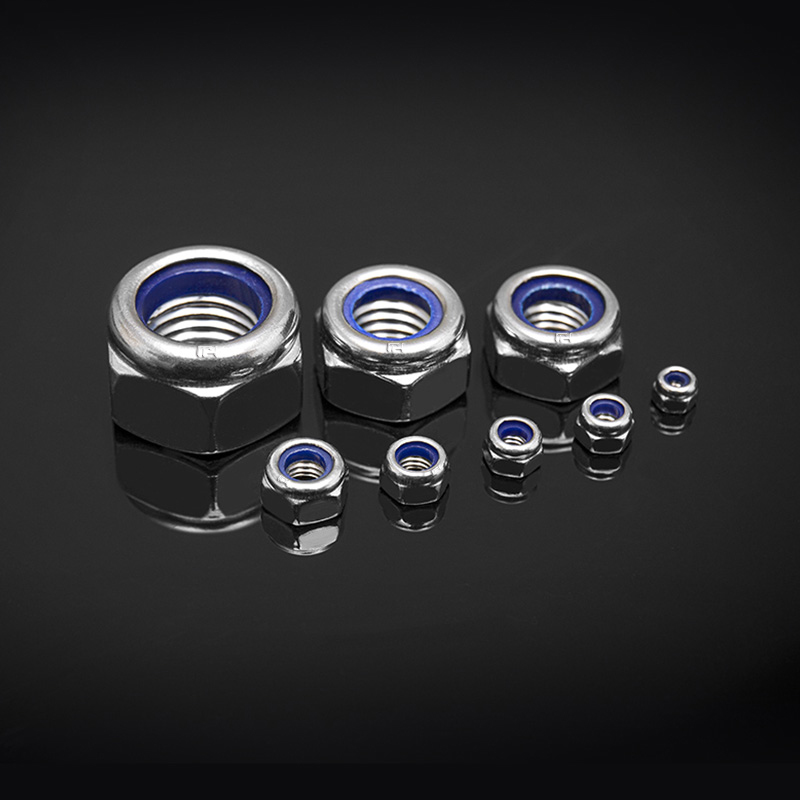 DIN 985 ruostumatonta terästä vallitseva vääntömomenttityyppi kuusikulmaiset ohuet mutterit, joissa ei-metallinen sisäosa